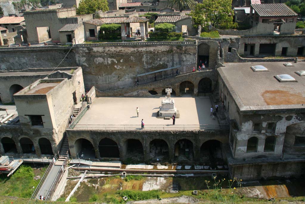 Herculaneum, April 2011.
Looking north from access roadway towards the Sacred Area, to the left of the Terrace of Marcus Nonius Balbus.
Above this area are the terraces of the Houses of the Mosaic Atrium, (left) and of the Stags, (in centre).
Photo courtesy of Klaus Heese.